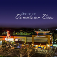 A shopping center photographed at night, links to Production portfolio